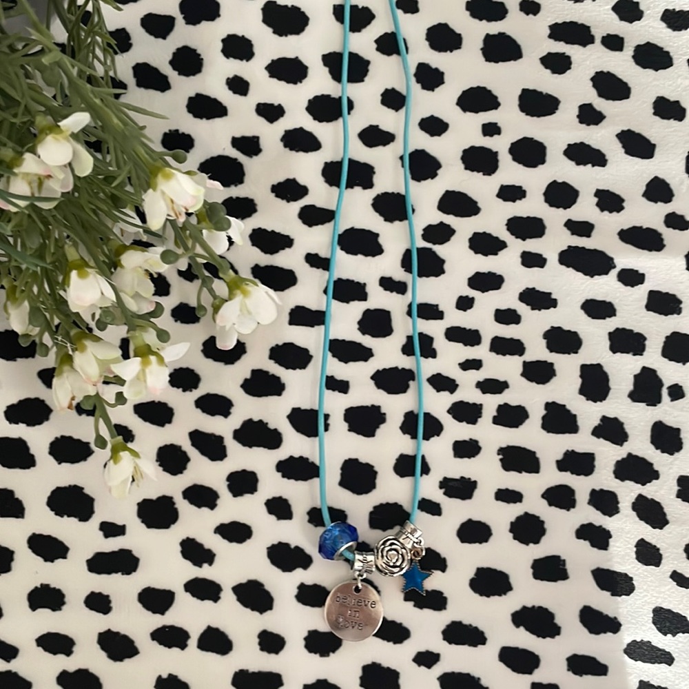 I’m selling this beautiful teal necklace! Silver and blue charms.💙